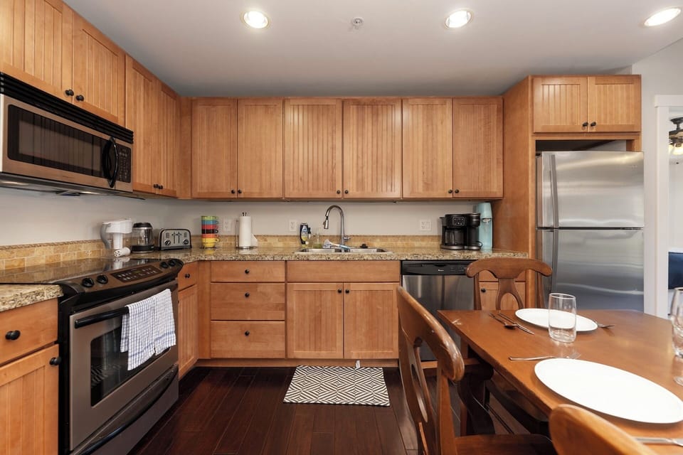 Open concept kitchen, dining and living area gives plenty of space to relax