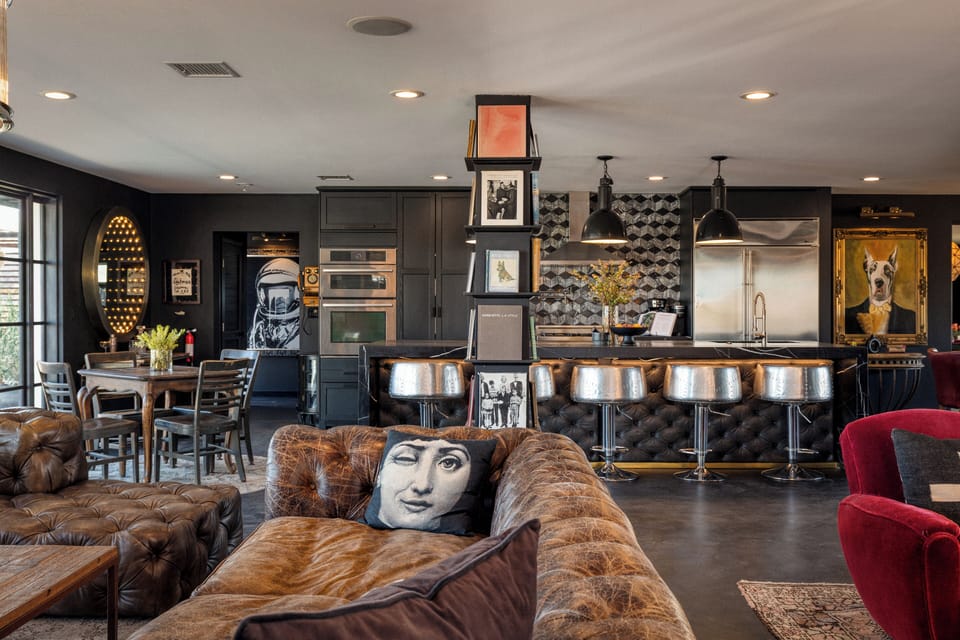 Main living room with open-concept flow to the kitchen and dining areas.