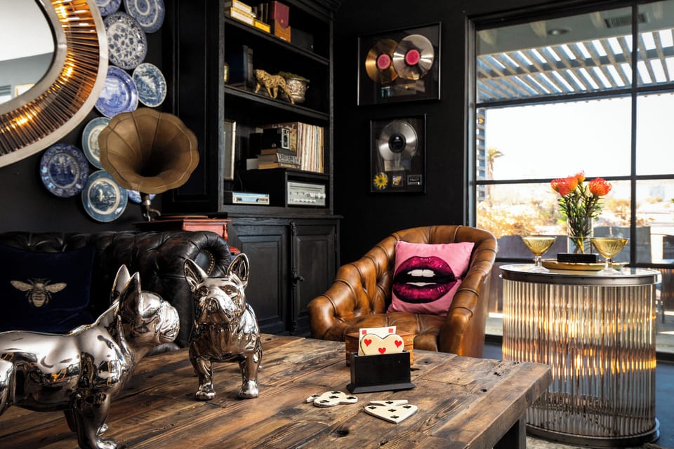 Second living room featuring an 8' billiards table and grand piano.