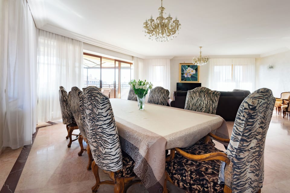 Apartment, 3 Bedrooms, City View | Living area | 50-inch flat-screen TV with cable channels