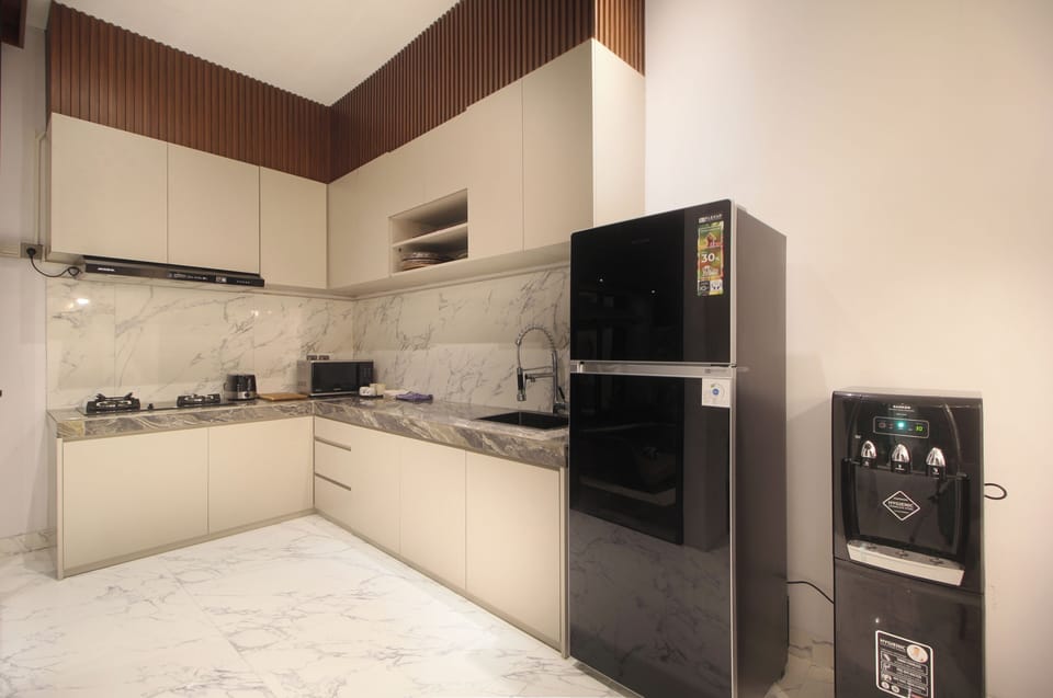 Deluxe Villa, 2 Bedrooms, Pool View, Poolside | Private kitchen | Coffee/tea maker, electric kettle