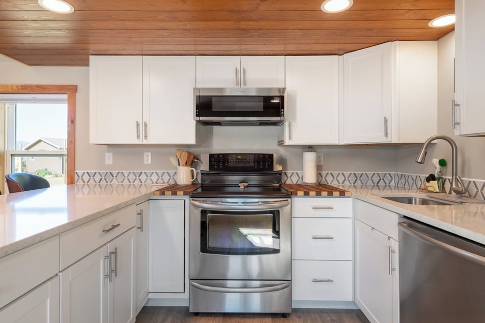 New fully stocked kitchen to make your own home cooked meals! 