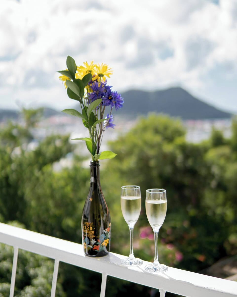 Sunny days and champs on the upper balcony are priceless.
