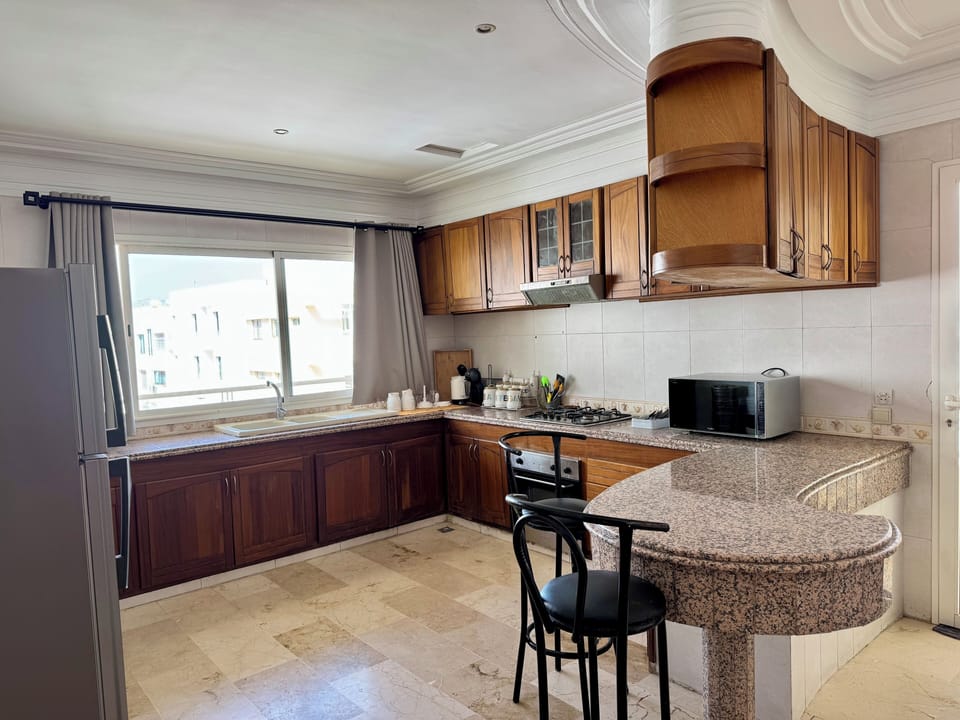 Deluxe Apartment, Balcony, City View | Private kitchen | Espresso maker, coffee/tea maker, shared fridge, shared microwave