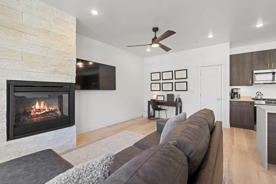 Living area with smart TV and gas fireplace.