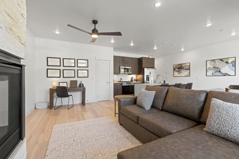 Living area with smart TV and gas fireplace.