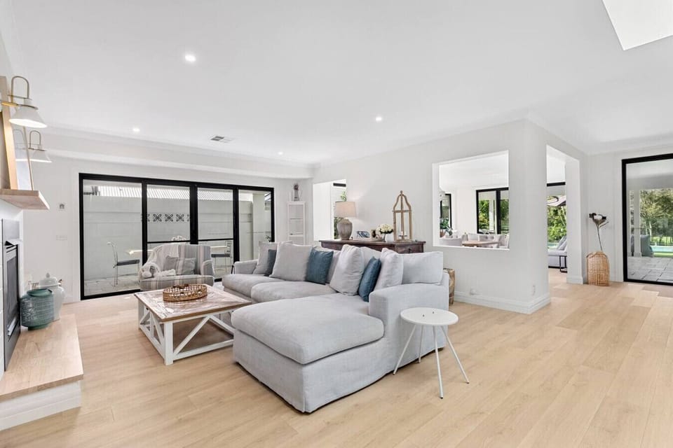 Turning from the entry way to soak in the fireside lounge, outdoor BBQ and courtyard dining, or let your eyes wander through to the formal dining and sitting area and out to the pool and golf course beyond.
