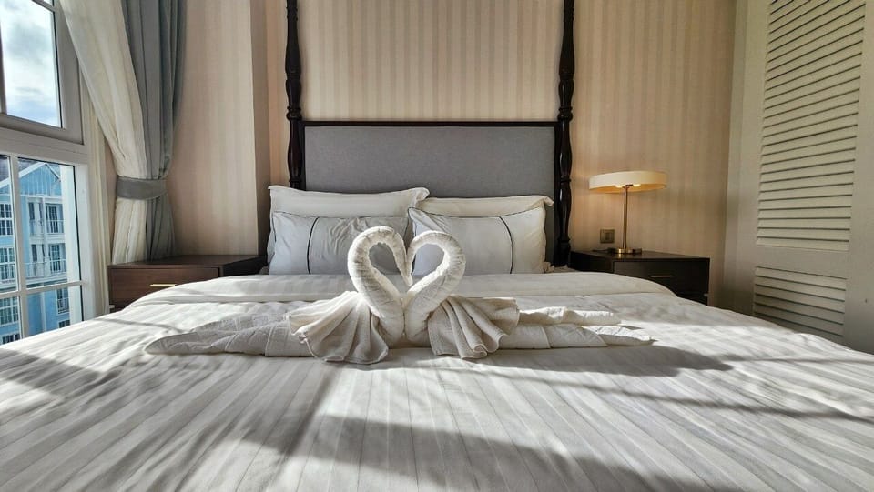 Condo, Pool View | In-room safe, laptop workspace, blackout drapes, iron/ironing board
