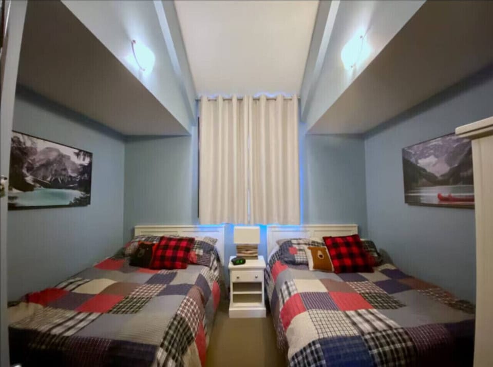 Bright and comfy twin beds for a relaxing stay