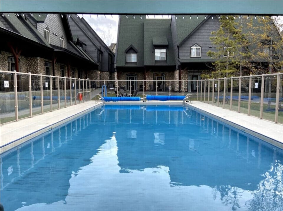 Crystal clear heated pool — jump in anytime.
