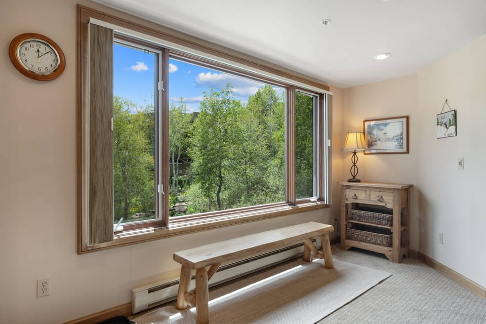 Sit and remove your hiking or ski boots as the sun streams in the big picture window