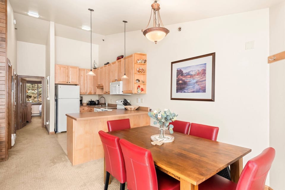 Prepare home-cooked meals in this bright, open kitchen that keeps the chef connected to conversations and mountain vistas