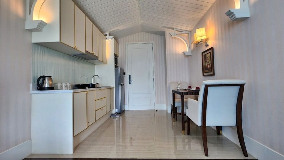 Condo, Balcony, Pool View | Private kitchenette | Full-size fridge, microwave, stovetop, electric kettle