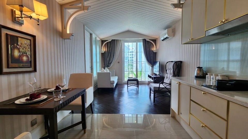 Condo, Balcony, Pool View | Private kitchenette | Full-size fridge, microwave, stovetop, electric kettle