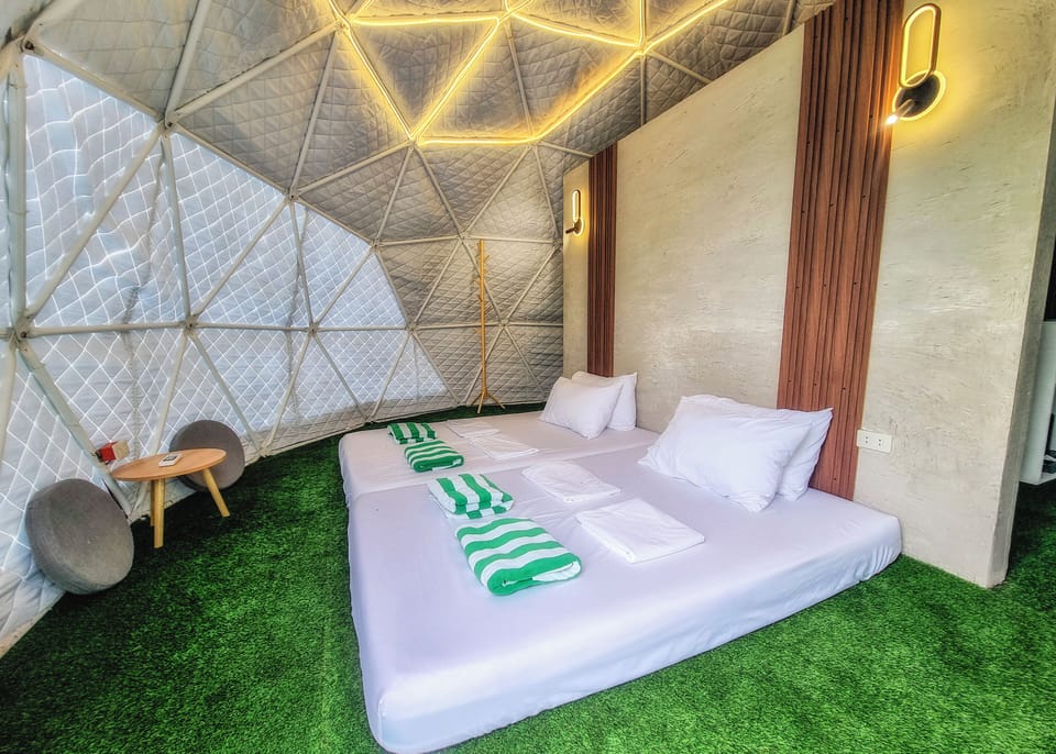 Basic Triple Room, Non Smoking, Garden View | In-room safe, blackout drapes, bed sheets
