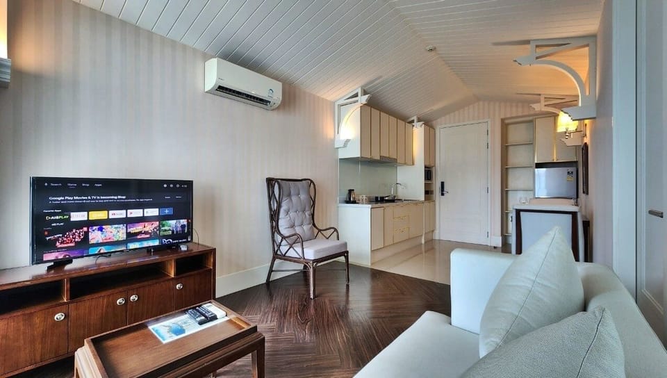 Condo, Balcony, Pool View | Living area | Flat-screen TV
