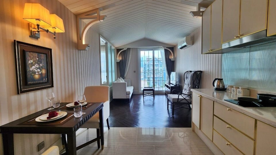 Condo, Balcony, Pool View | Private kitchenette | Full-size fridge, microwave, stovetop, electric kettle