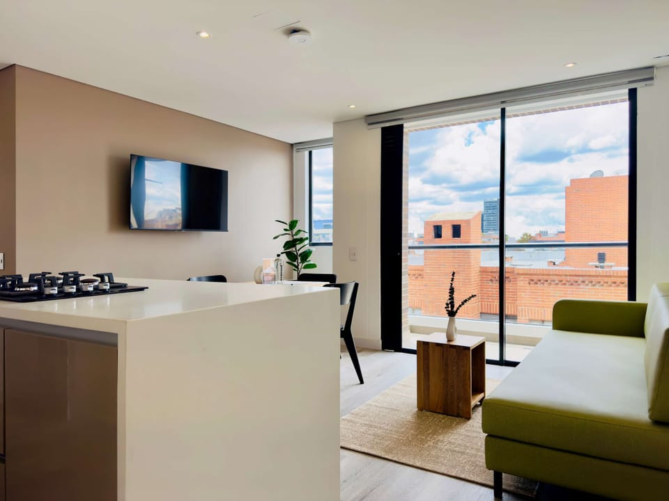 Modern living room with open kitchen