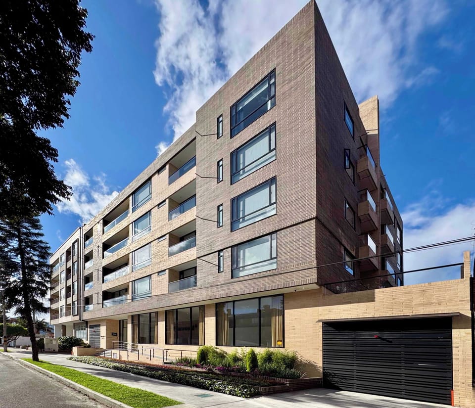 Modern building on a quiet tree-lined street