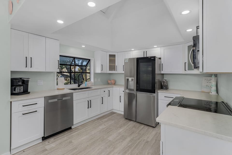 Main level kitchen is very well stocked for your group gatherings.