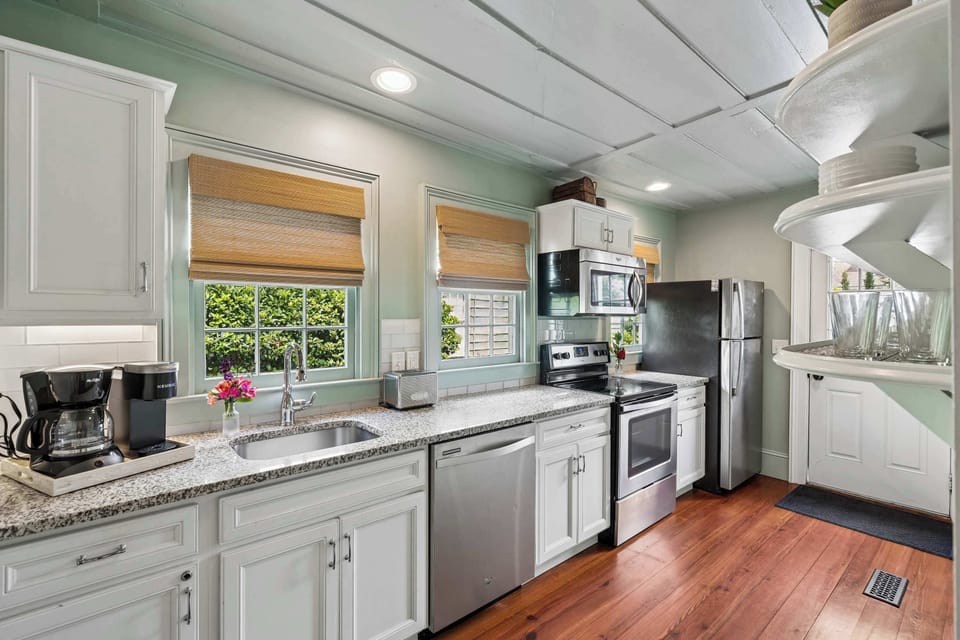 Kitchen #1: Thoughtfully appointed with modern appliances, generous natural light, and all the cooking and dining essentials, this kitchen makes every meal feel at home.