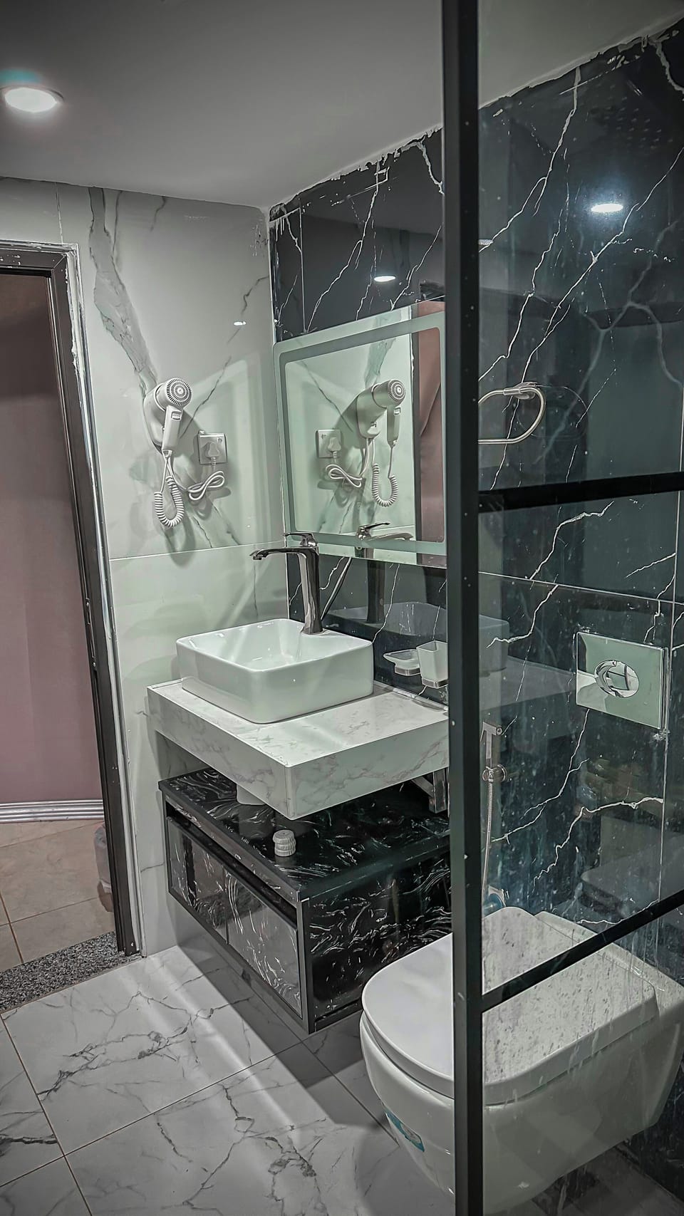 Separate tub and shower, towels, soap, shampoo