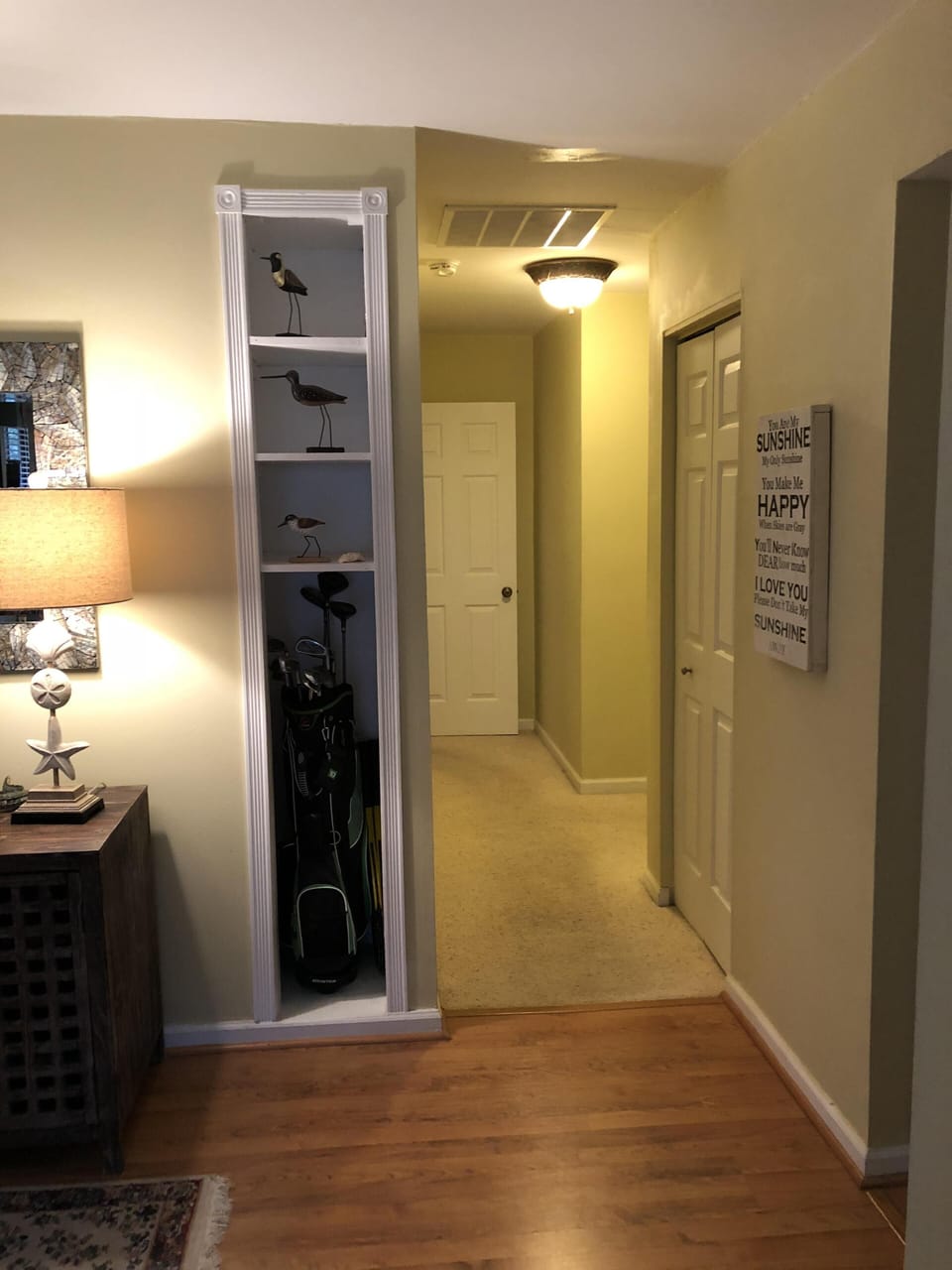 entrance leading to second bath on the right and master bath at the end.