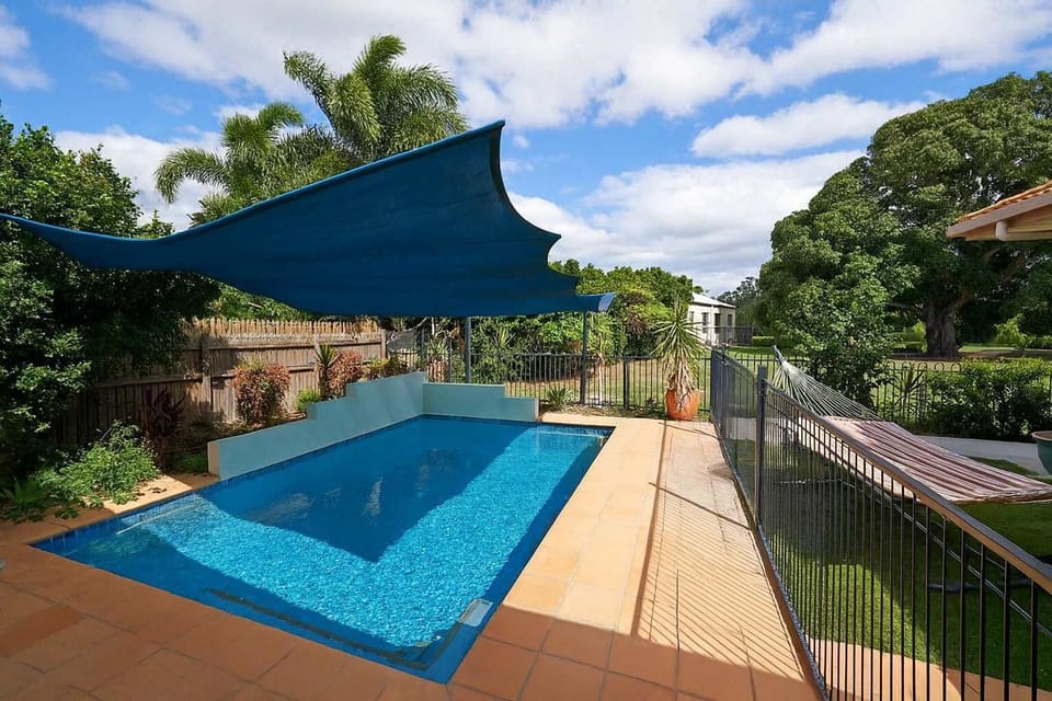 Enjoy the best of outdoor living with a spacious entertainment area right beside the pool. It’s the ideal spot for family barbecues, lounging in the sun, or evening gatherings by the water.