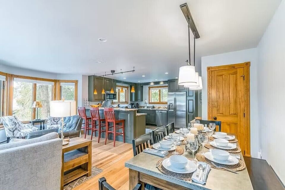 Dining Room - Open concept kitchen, living and dining area with dining table seating for 8