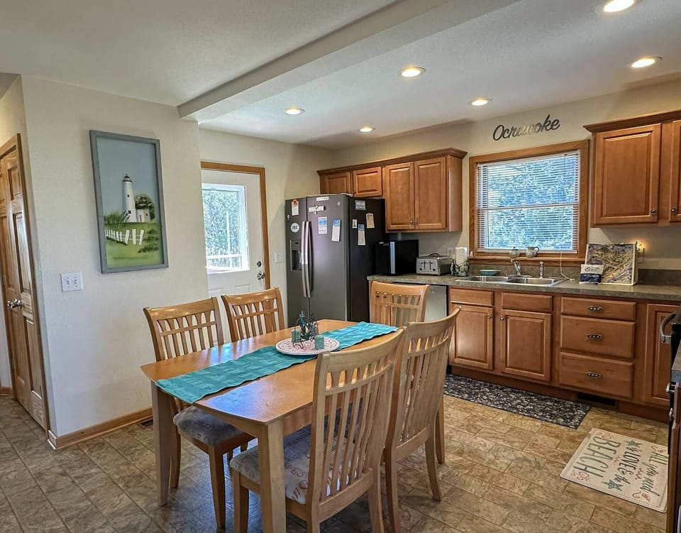 Kitchen with Access to Deck and Enclosed Yard