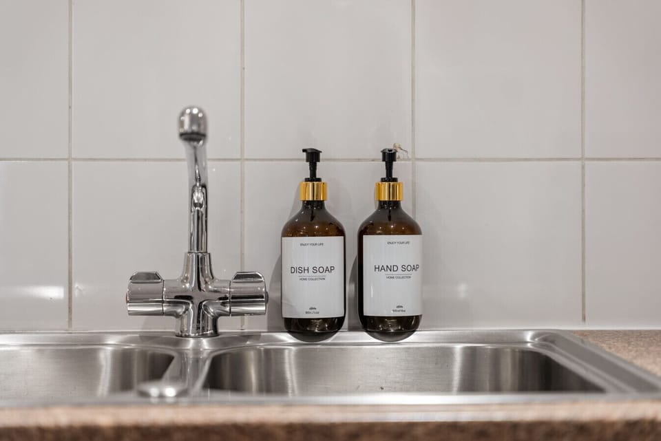 Kitchen Sink Area - Clean and practical kitchen workspace designed for convenience during your stay.