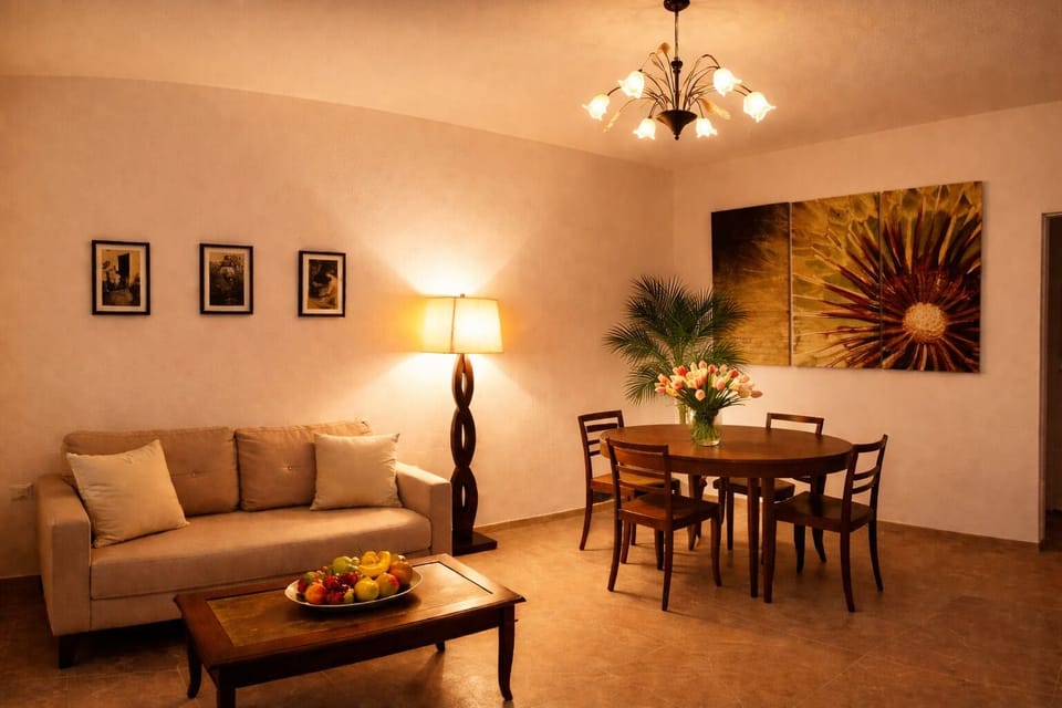 Deluxe Suite, Patio, Pool View | Living area