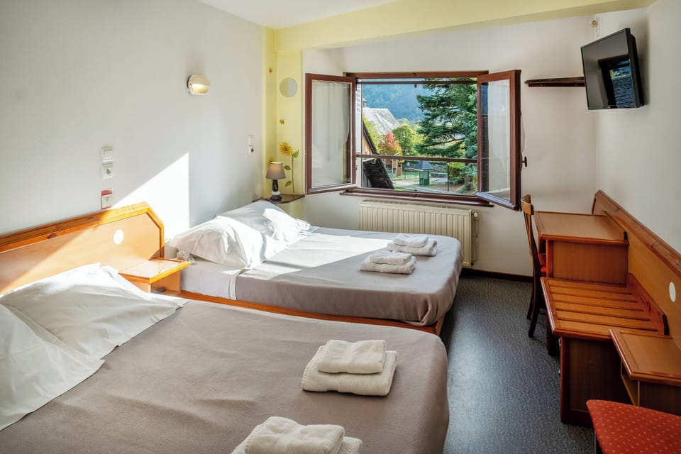 Standard Quadruple Room, Mountain View | Soundproofing, free WiFi