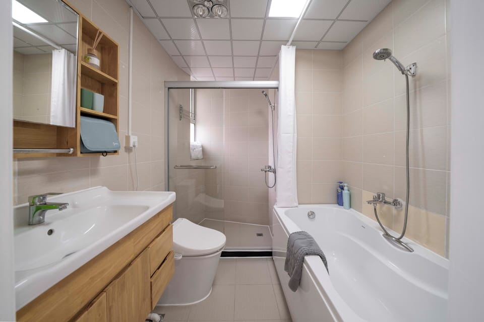 Superior Apartment, Balcony, City View | Bathroom | Free toiletries, slippers, towels, soap