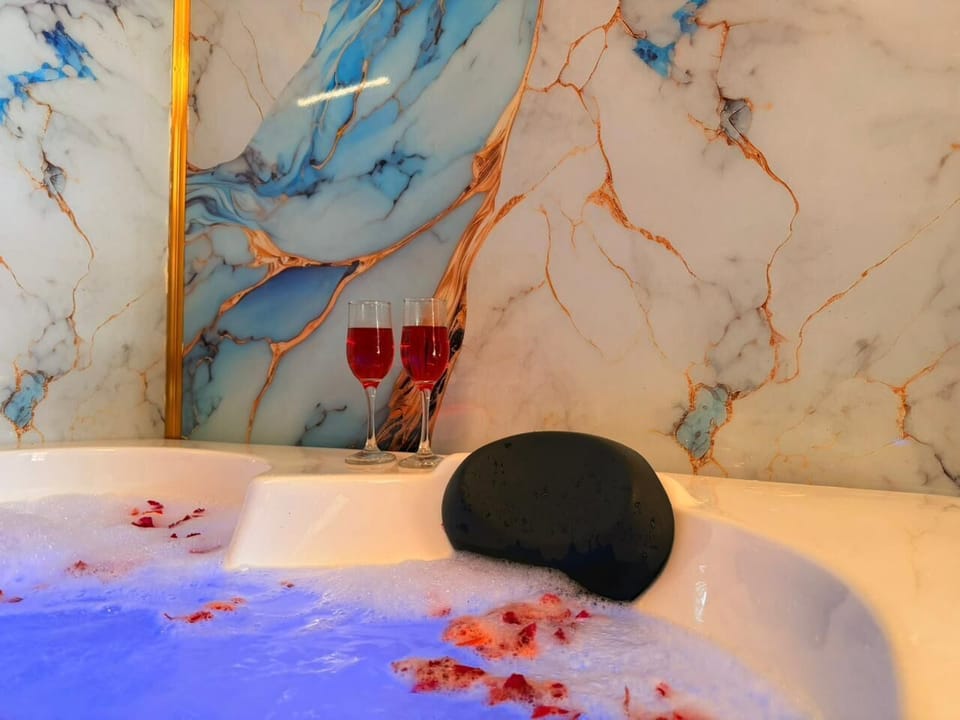 Jasmine Super deluxe Jacuzzi 2bhk | Bathroom | Towels, soap, toilet paper