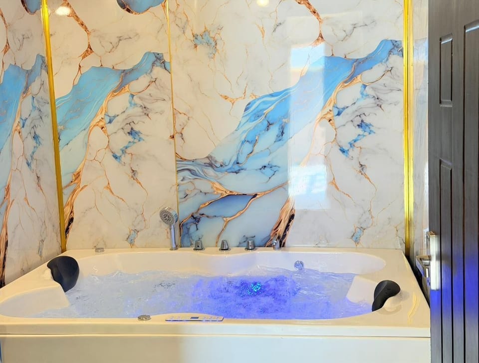 Jasmine Super deluxe Jacuzzi 2bhk | Bathroom | Towels, soap, toilet paper
