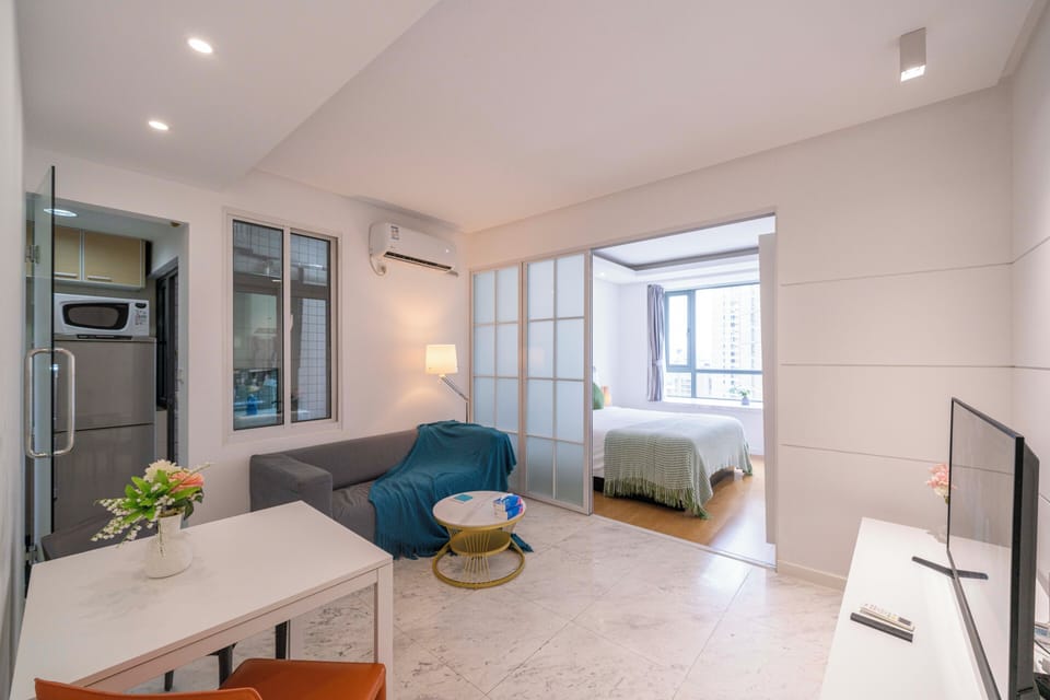 Superior Apartment, 1 Bedroom, Microwave, City View | Living room | 55-inch Smart TV with cable channels