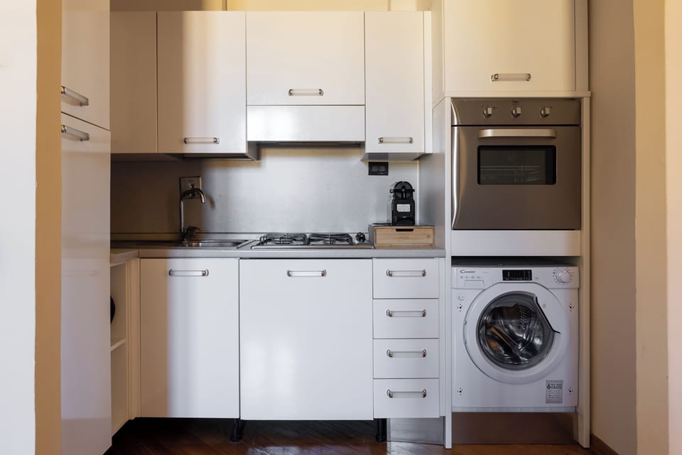 Appartamento, vista città - 5° piano senza ascensore- | Private kitchen | Fridge, oven, stovetop, dishwasher