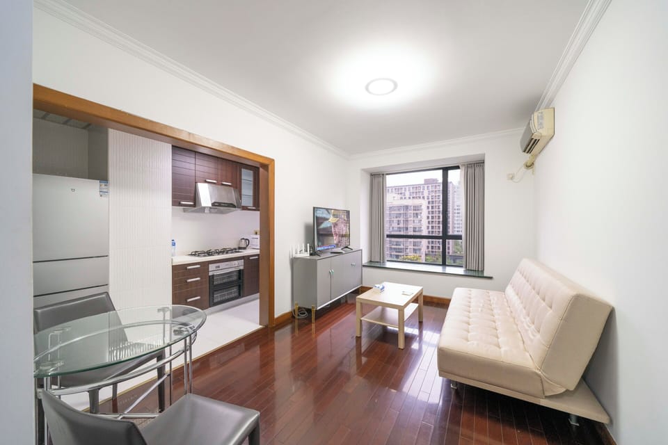 Superior Apartment, 1 Bedroom, Kitchen, City View | Living room | 55-inch Smart TV with cable channels