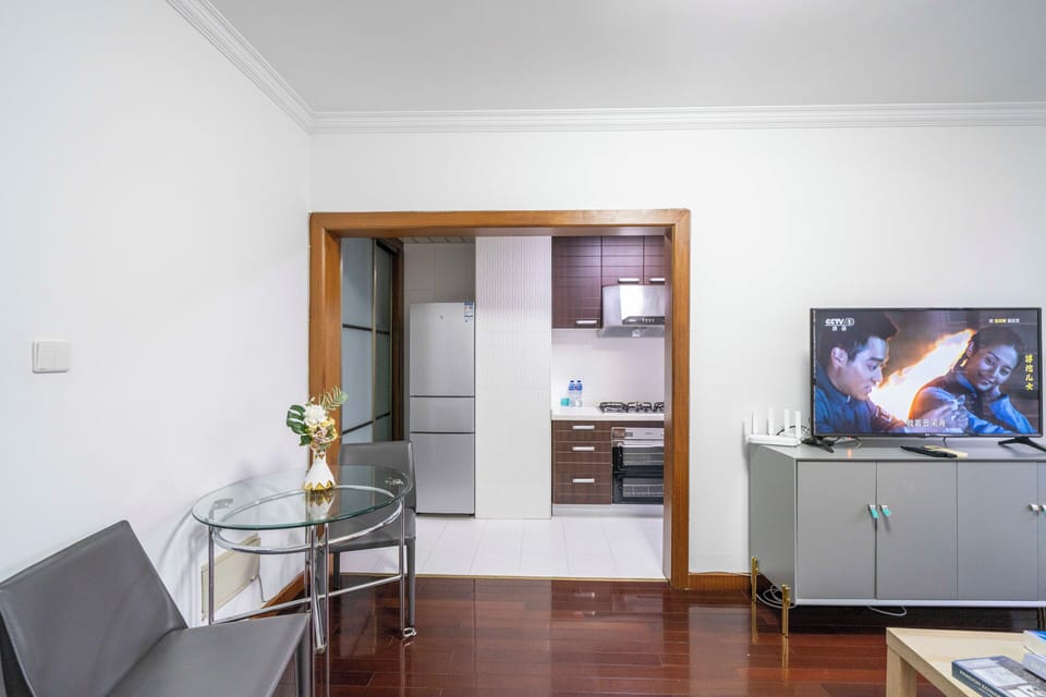 Superior Apartment, 1 Bedroom, Kitchen, City View | Living room | 55-inch Smart TV with cable channels