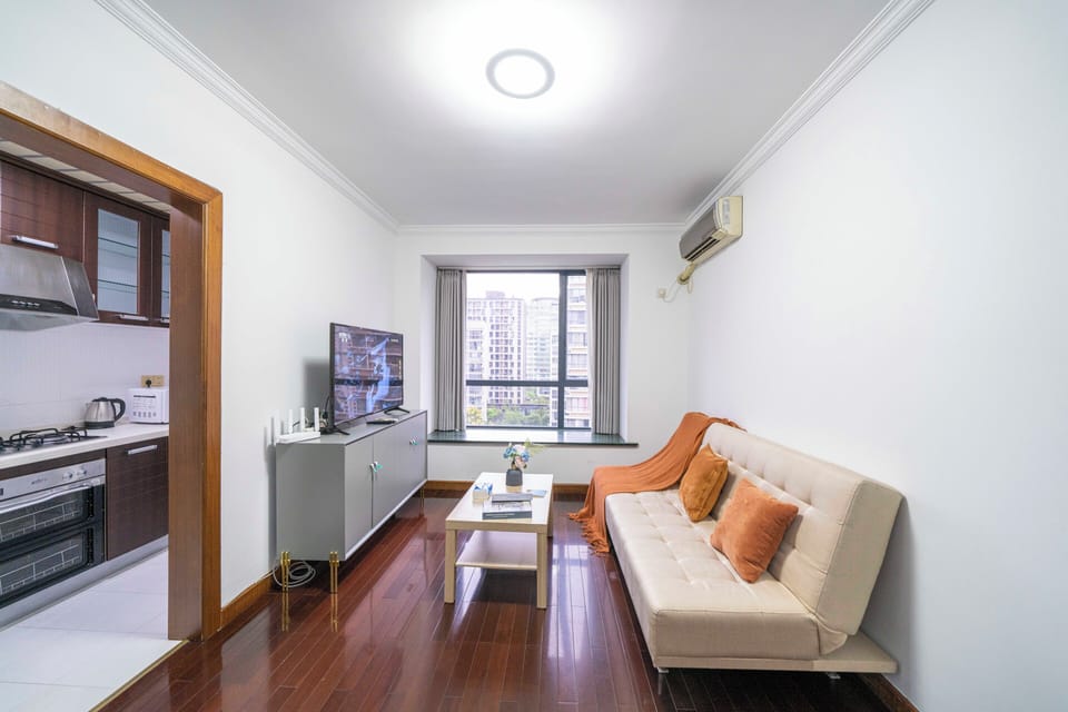 Superior Apartment, 1 Bedroom, Kitchen, City View | Living room | 55-inch Smart TV with cable channels