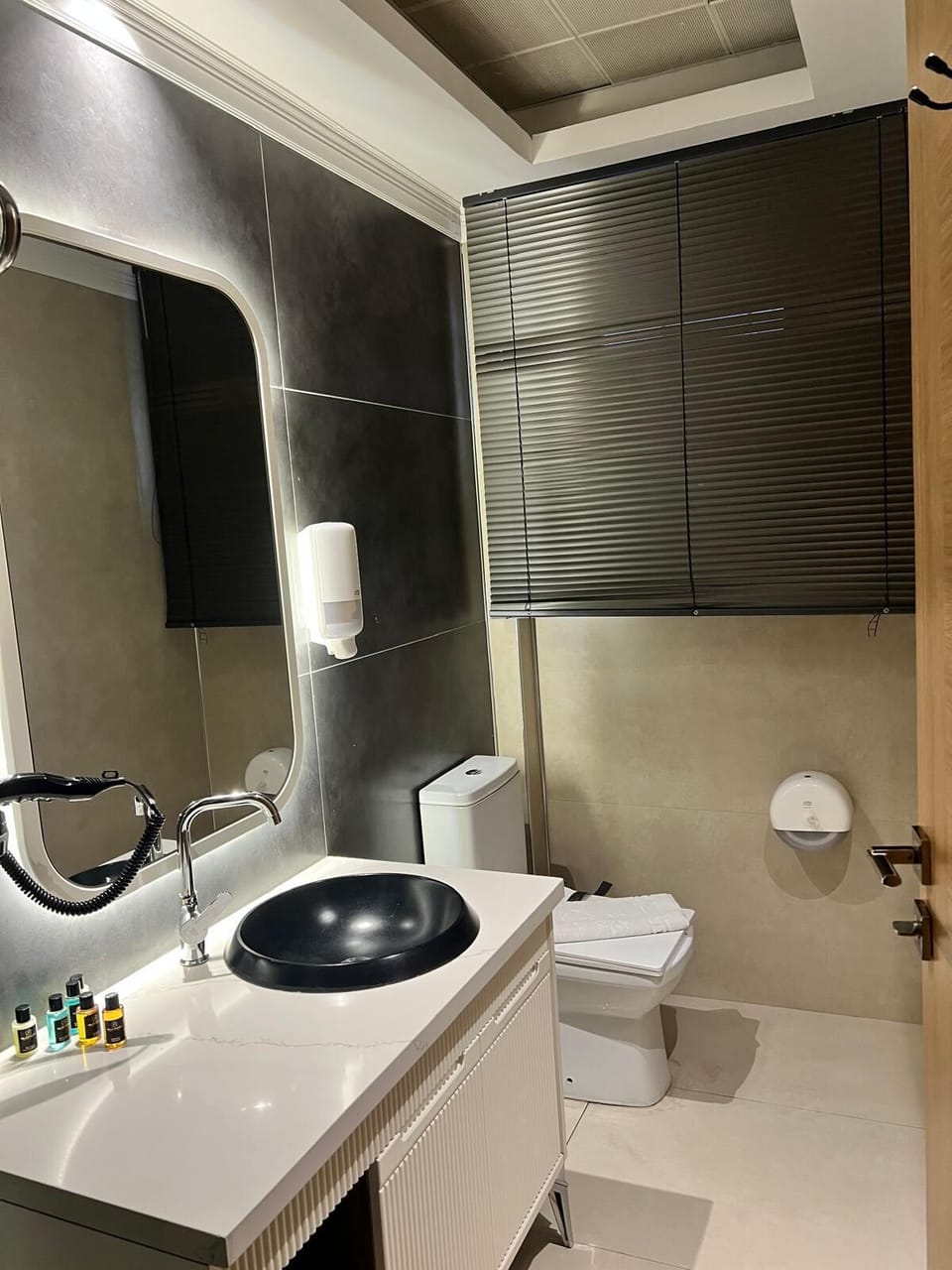 Family Quadruple Room, City View | Bathroom | Shower, hair dryer, slippers, towels
