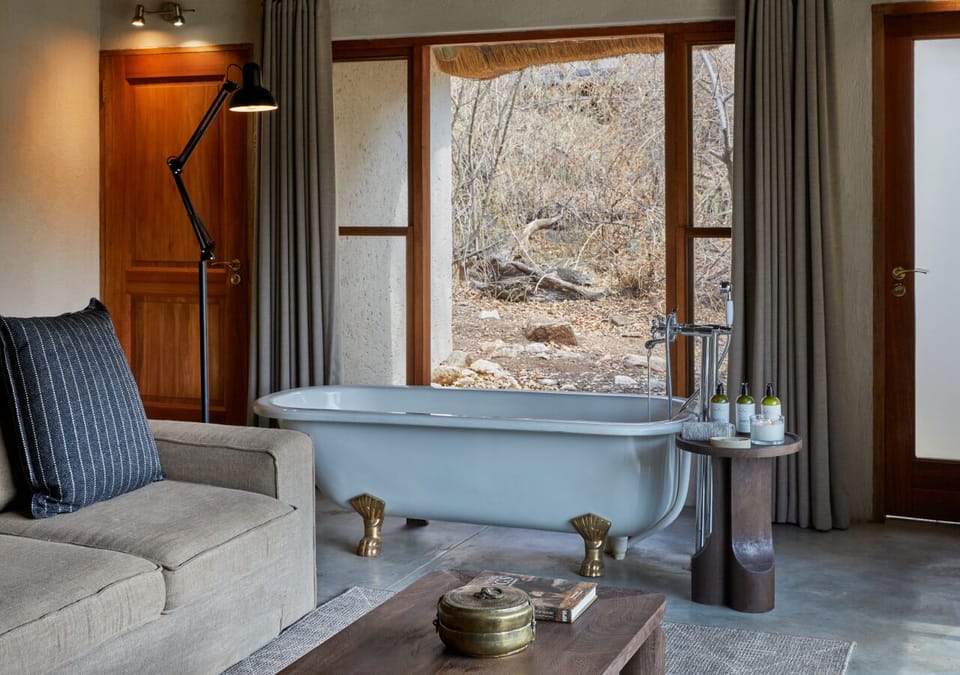 Luxury Suite | Bathroom | Separate tub and shower, slippers, towels, soap