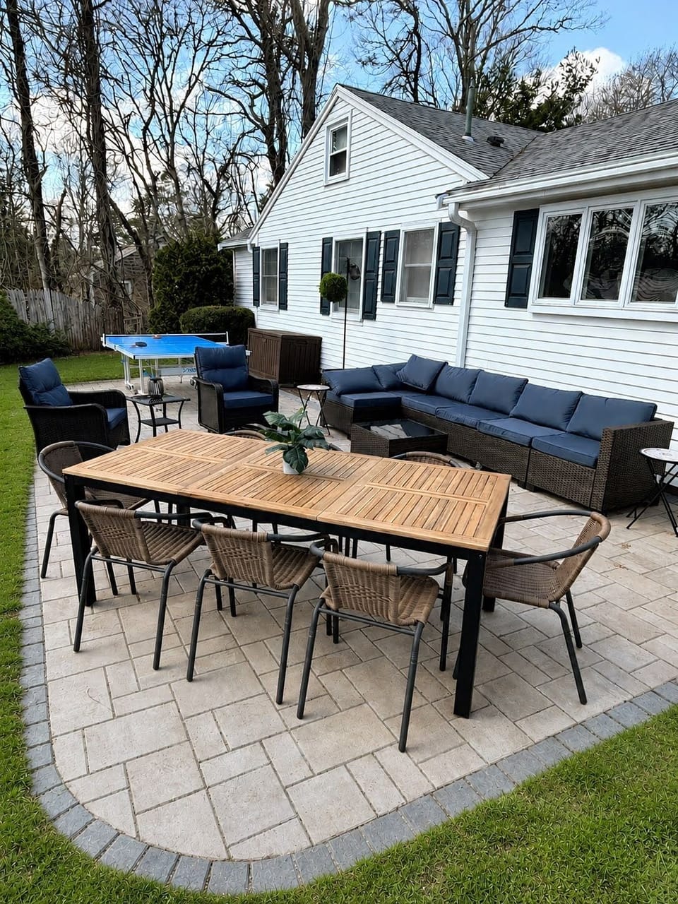 Fully equipped patio with dining table, couch, grill and ping pong table