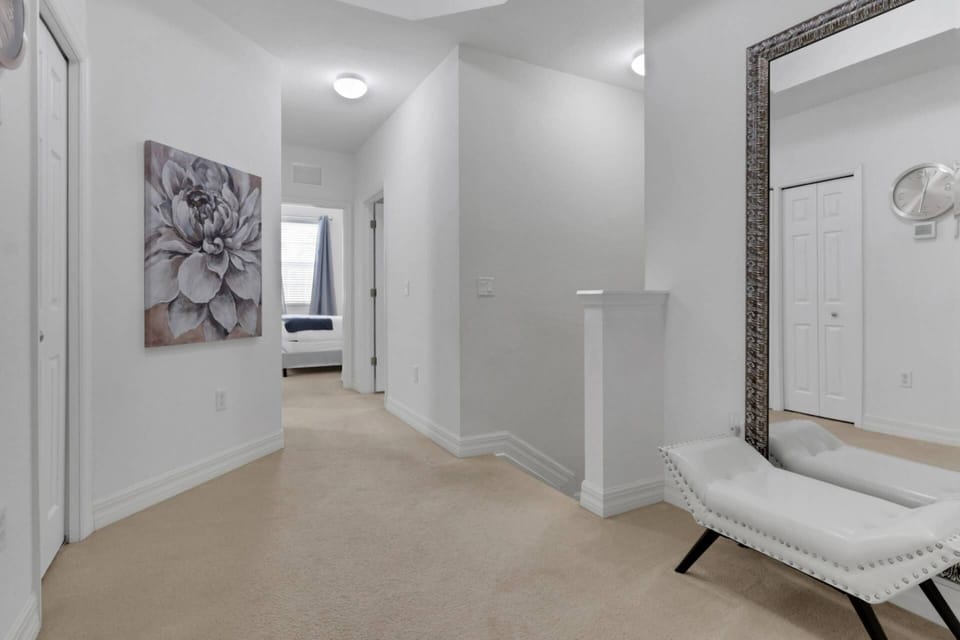 On the 2nd level of the townhome you'll find 3 guest bedrooms, 2 full bathrooms and the laundry room.