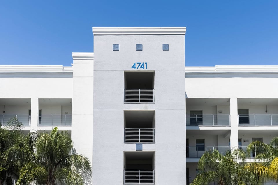Welcome to your home away from home, where modern design meets comfort. Enjoy the bright white exterior and lush greenery while relaxing on spacious balconies with fresh air and breathtaking views throughout your stay.