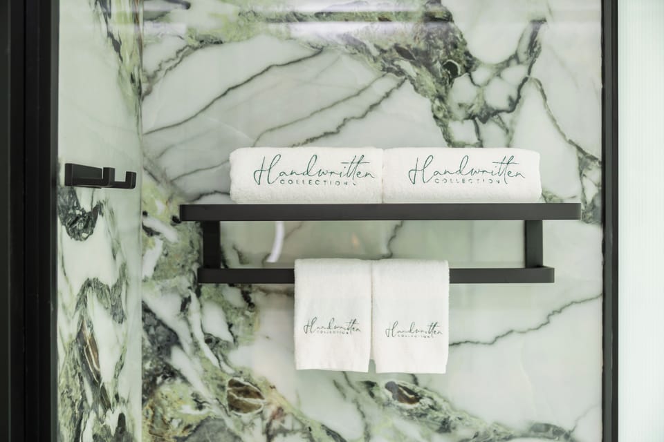 Shower, rainfall showerhead, eco-friendly toiletries, hair dryer