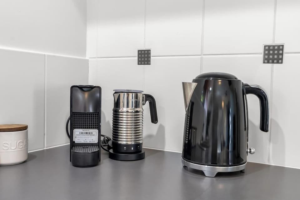 Fuel your day with a fresh cup from the in-room coffee station—your cosy corner for a morning pick-me-up or an afternoon recharge.