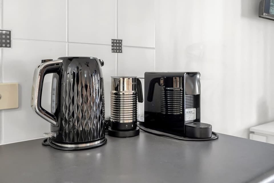 Start your mornings right with a fresh brew from the in-room coffee machine—perfect for sipping on the balcony or planning your next beach stroll.