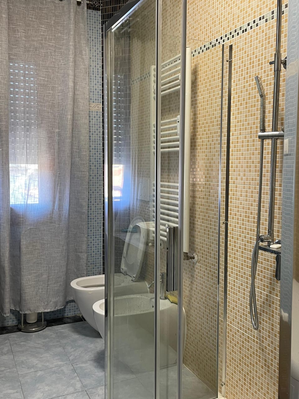 Shower, towels, soap, shampoo